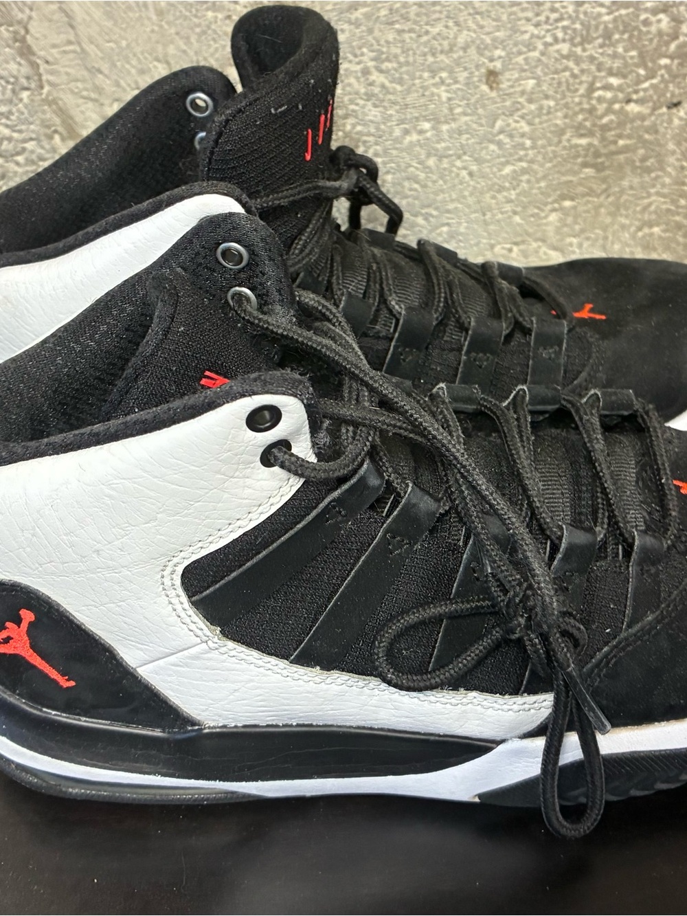 Jordan Black and White High-Top Sneakers with Red Jumpman